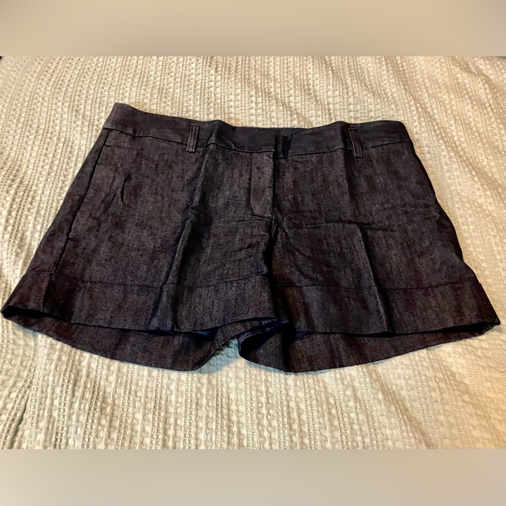 Size 10 Express pleated dark denim cuff shorts.